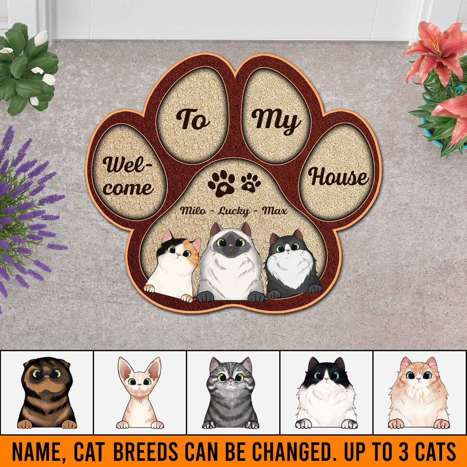 http://bmgifts.co/cdn/shop/products/cat-welcome-to-our-house-personalized-custom-shaped-doormat-personalized-gift-for-cat-lovers-cat-mom-cat-dad-cd001ps07-bmgifts-1.jpg?v=1702116454